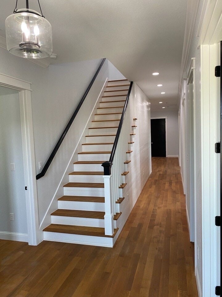 custom home with wood stairs